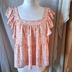 sienna sky Orange floral top with ruffle sleeves and square neckline. Size: M